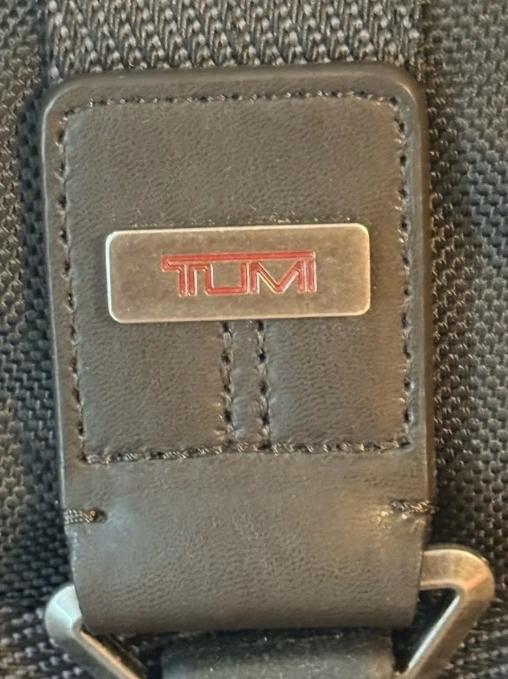 Tumi Black Roll-Top Backpack with Leather Base